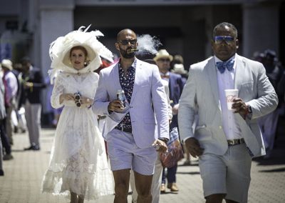 Victorian-inspired finery was a striking contrast to men's modern short suits.