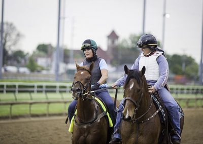 Trainer Vicki Oliver — the first female trainer to make it to the Derby in six years — finishes a morning workout with Hidden Stash.