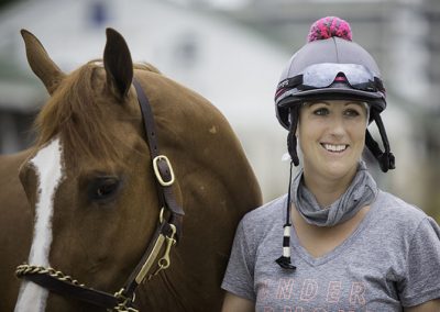 Exercise rider and local Pilates instructor, Jo Trout, with Purrfect Love.
