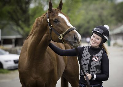 "I was riding this horse and there were all these people watching, so I stopped so the kids could look at him and the mom came running over and said, 'They’re so proud that you’re a woman.' I didn’t realize that there are people — little girls and women —watching me out here and rooting for me," says Kylie Wellington, exercise rider for Wayne Lucas and an aspiring jockey.